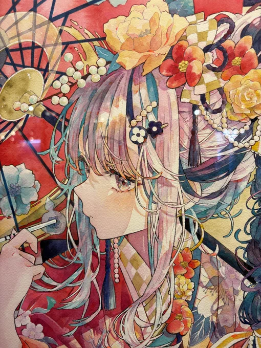 少し前に優子鈴さんの原画展も見てきたのですが、この写真左が原画(水彩)で右が印刷商品なんです。実物でも見分けがつかないくらいで、最近の印刷技術はすごいですね。