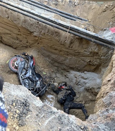 RajatJain's tweet photo. The cost of being a law-abiding citizen in India’s National Capital:
• You pay your GST and Income Tax on time.
• You navigate "world-class" infrastructure projects.
• You end up in a 10-foot pit because the DJB/PWD forgot to put up a basic barricade.
A 25-year-old life lost in Janakpuri because safety protocols are treated as "optional" by contractors. Absolute administrative murder.
#Delhi #Infrastructure #Janakpuri #UrbanSafety