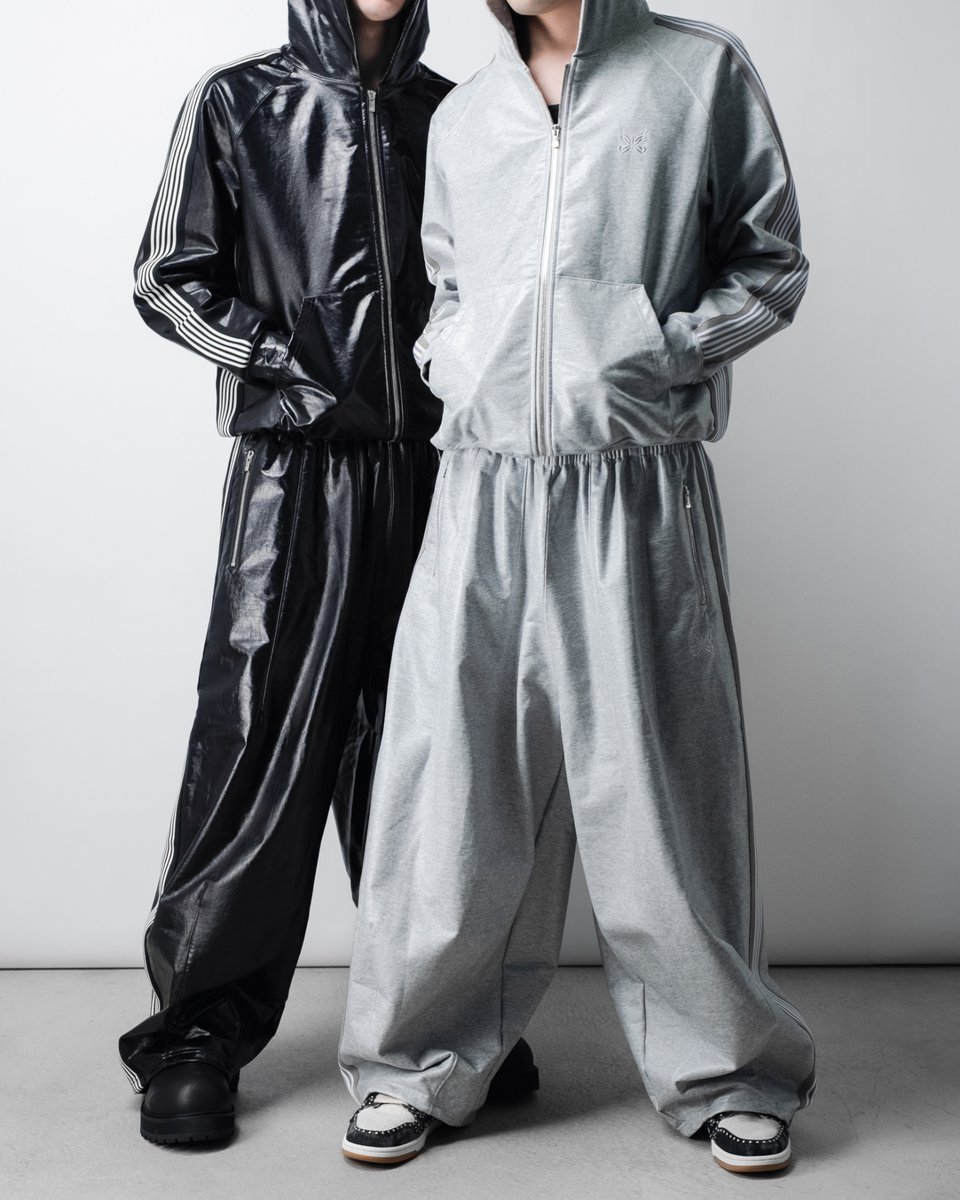 Needles × NUBIAN』コーティング加工を施したトラックスウェット