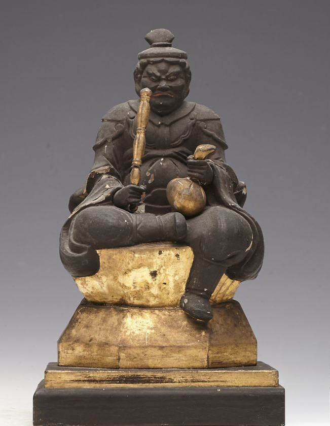 大黒様の初期のお姿である将軍大黒天が右手に棒・左手に宝袋・臼に