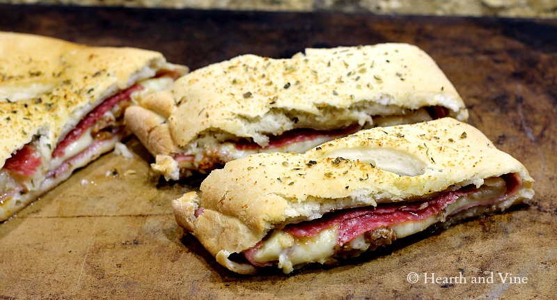 Italian Stromboli Easy Recipe Perfect for the Super Bowl.  hearthandvine.com/game-day-eats-…