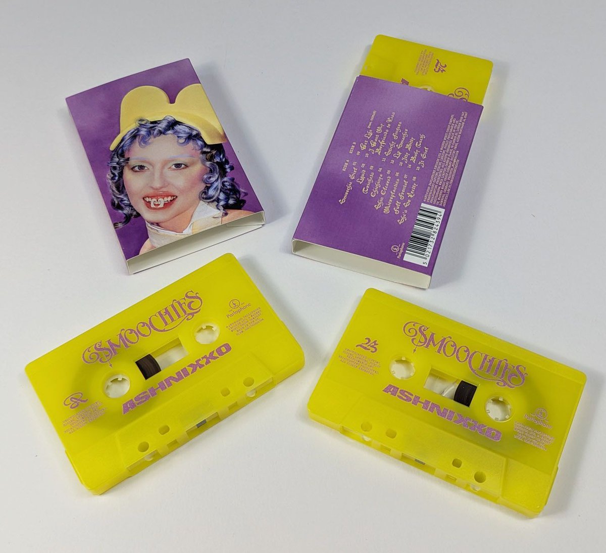 BandCDs's tweet photo. Here are some beautifully bright cassettes in printed o-cards created for '@Ashnikko - Smoochies' 💜 💛 https://t.co/G1owzE8T8Y