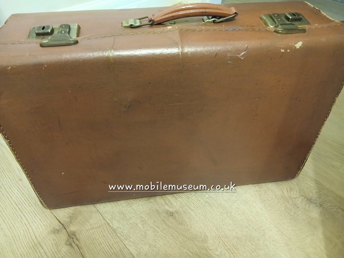 TheMobileMuseum's tweet photo. Thought I'd cheer my old suitcase up. A few vintage style stickers really make a difference. Looks great now. Inside are Pelham puppets, Sooty &amp; Sweep, roller skates, a growling teddy bear, Janet &amp; John books &amp; more. This children's suitcase is always very popular. #nostalgia https://t.co/Gk6bmdeNlV