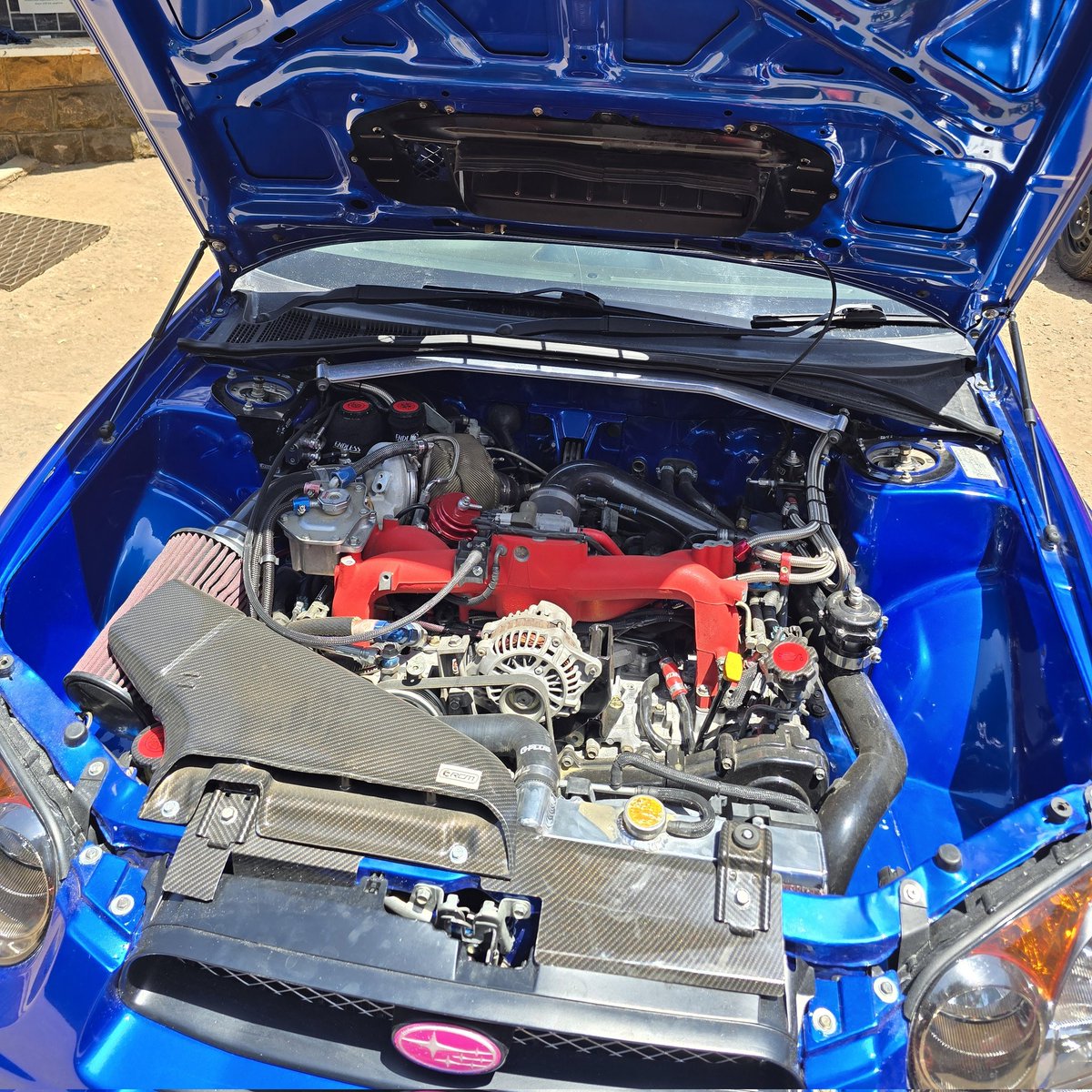 I visited a garage and found a daily driven GD that's clean as a whistle and has a shaved engine bay with a big bad snail under there.
Piloted by <a href="/ahil_k555/">Ahil</a>