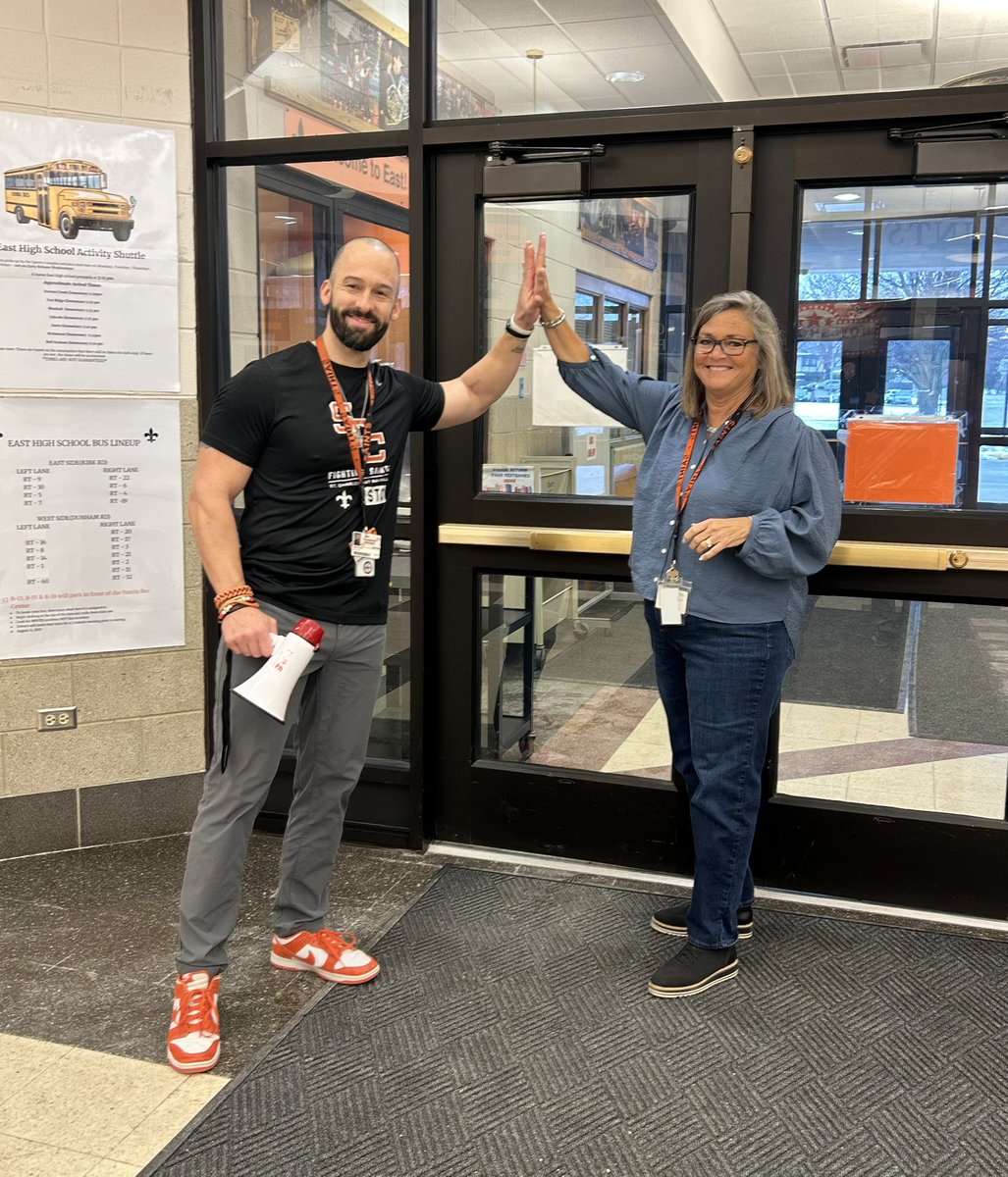 CoachSutor's tweet photo. This week’s #StartANewTrend task:

#Greet9People

I started off the day greeting students and staff for a half hour as they walked into school.

Was I a little obnoxious? Probably. 🤷‍♂️

But the smiles, laughs, “Happy Friday!”s high fives and fist bumps were more than worth it. https://t.co/cfAm5UdEgI