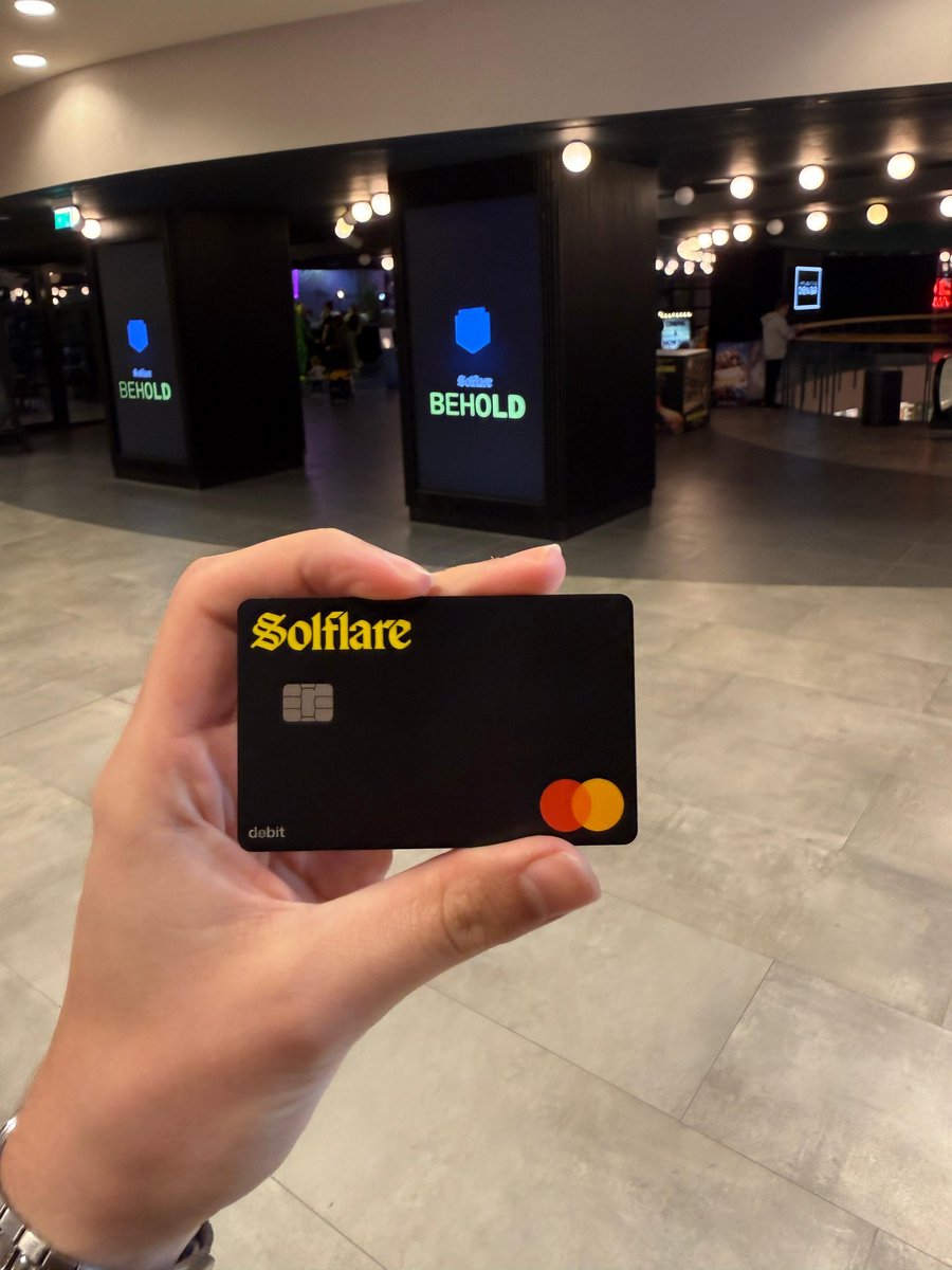 Qester's tweet image. A Solflare card in hand, What's the first thing you are buying ?