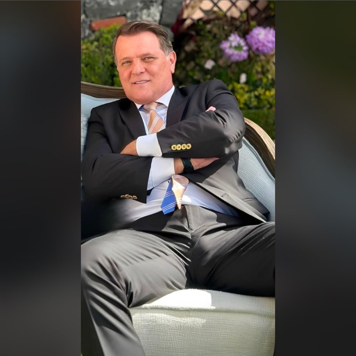 CEO Daddy sits with his legs wide open to show why he’s in charge.