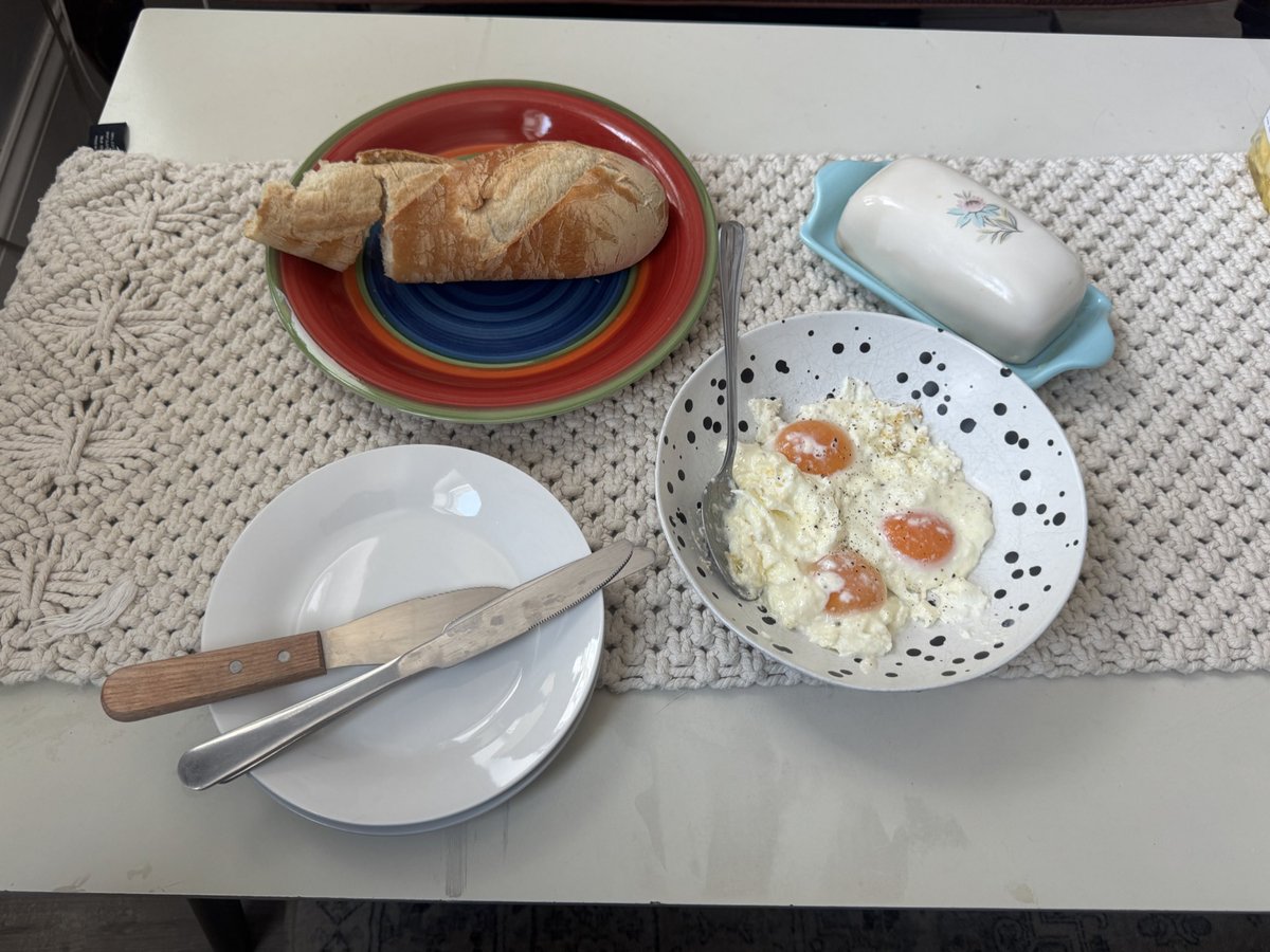 Breakfast today 3 eggs fried in heavy cream with some warm bread