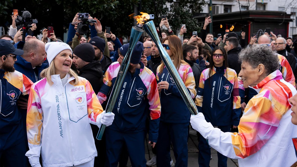 An emotional handover during the Olympic Torch Relay in Milan, as Anita DeFrantz passed the flame to IOC President Kirsty Coventry ahead of the <a href="/milanocortina26/">Milano Cortina 2026</a> Opening Ceremony. #MilanoCortina2026

👉 oly.ch/3MaMWsQ