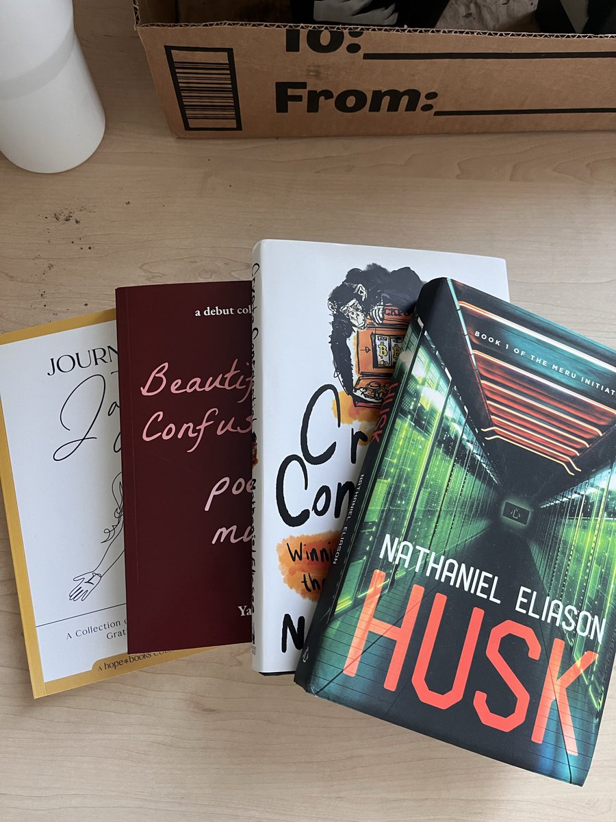 packing up some books for a move, pretty fun to have a few hard copies that were written by people I know