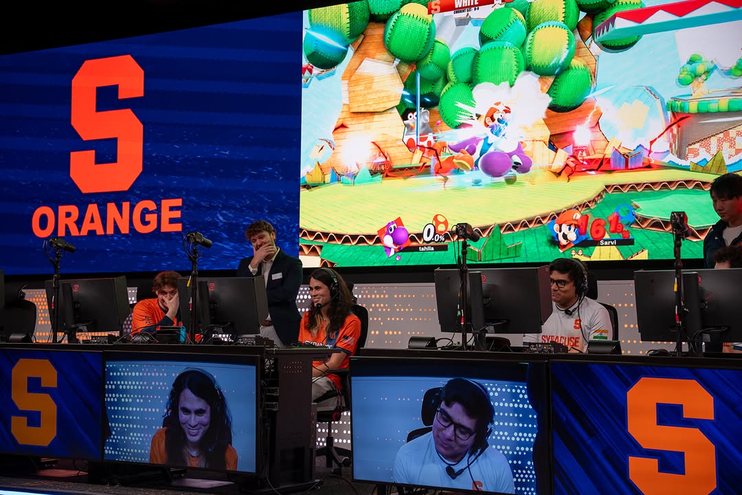 SyracuseUToday's tweet photo. Grand opening today for @Cuse_Esports' new state-of-the-art auditorium in Marley Education Center! 🥇 The space showcases our varsity teams in a way no other campus does &amp; was inaugurated with a demo Super Smash Bros match. https://t.co/deuaLAexxt