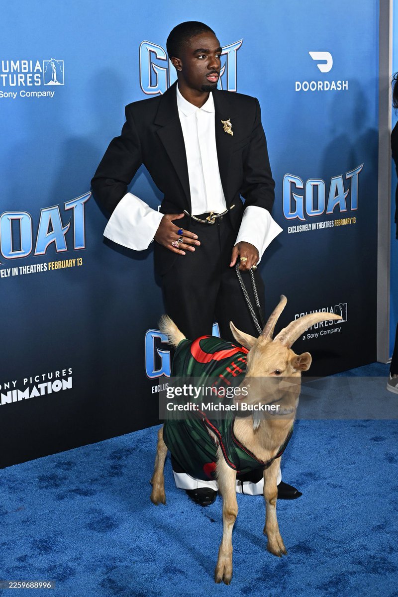 Caleb McLaughlin posed with an actual goat at the world premiere of his movie, GOAT.