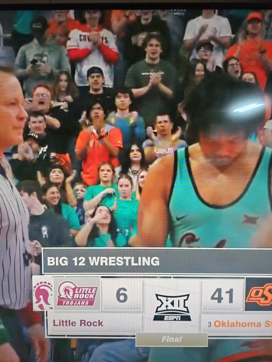 EricVaughan1's tweet photo. Matmaid imitating Cody Merrill's hand shake. #okstate https://t.co/FQsyKw1CRV