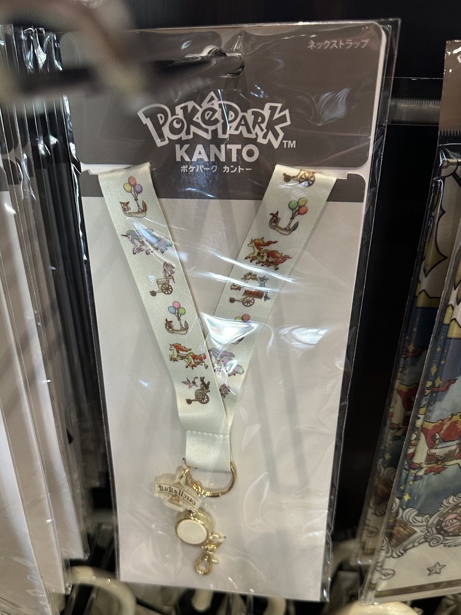 ポケパークで売ってるネックストラップ、ポケモンのピンズ交換するとき