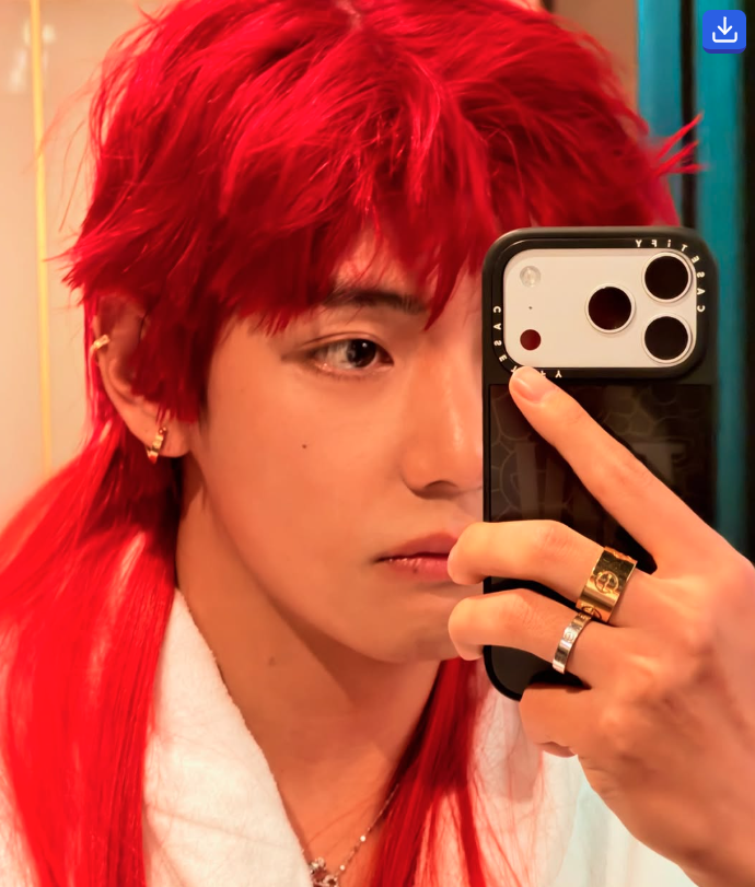 Taehyung stuns with long red hair.