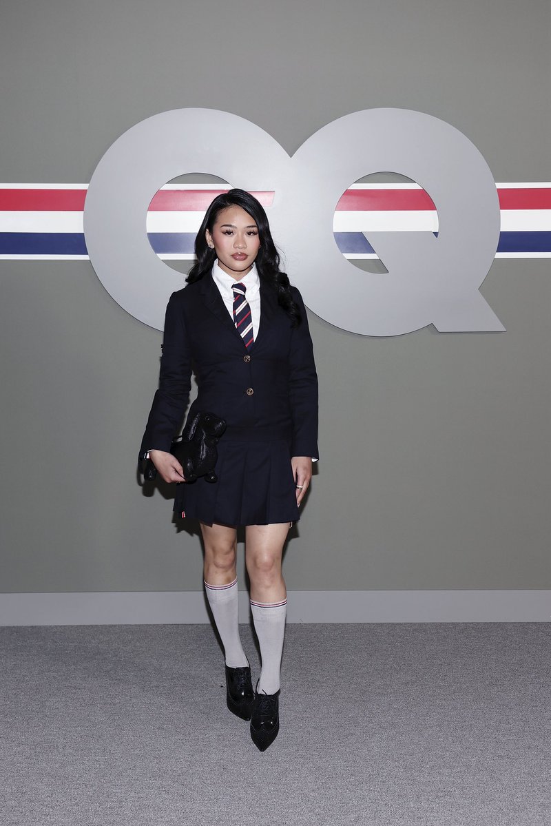 Complex's tweet image. Suni Lee attends the GQ Bowl ✨