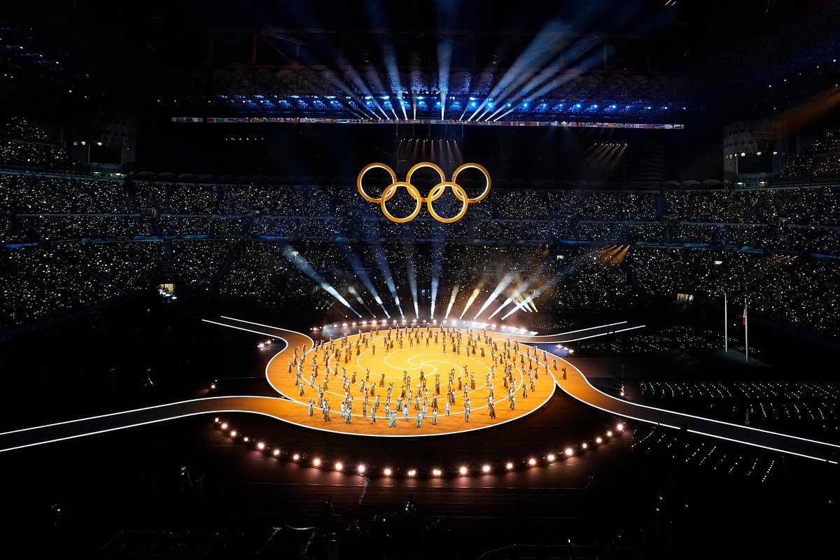 Frontlinestory's tweet photo. #FrontlineFocus Milano Cortina 2026 Opens with “Harmony” Across Italy. Which is your favorite moment?

The Milano Cortina 2026 Winter Olympic Games kicked off on Thursday night at Milan’s San Siro Stadium, delivering an Opening Ceremony that redefined Olympic storytelling. Under the theme “Harmony,” the ceremony combined art, technology and live connections across multiple host locations, highlighting Italy’s cultural heritage, contemporary creativity and the balance between cities and mountains.

Here are the unforgettable moments from the Opening Ceremony:

🎨 A Ceremony Painted in Three Colors
Three giant paint tubes in red, yellow and blue descended from the stadium roof. The primary colors, symbolizing creativity and infinite possibility, set the visual tone. A grand festive parade unfolded around the colors

🎭 Opera Legends Join the Celebration
Italy’s iconic composers Verdi, Puccini and Rossini were brought to life. The masters appeared in playful dance performances, blending classical culture with modern stage expression.

🌍 One Parade, Multiple Cities
Athletes did not gather in a single stadium. Competitors in Cortina d’Ampezzo, Livigno and Predazzo took part in simultaneous entrance ceremonies at local venues, turning Italy’s geography into a shared Olympic stage.

🎹 Lang Lang Returns to the Olympic Stage
Eighteen years after his last Olympic appearance, Lang Lang returned and performed the Olympic Hymn during the raising of the Olympic flag. The show was joined by Italian mezzo-soprano Cecilia Bartoli, and accompanied by the La Scala Theatre Children’s Choir.

🔥 Two Cities, One Olympic Flame
For the first time, the Olympic cauldron was lit simultaneously in two cities.
📍 Milan – Arco della Pace
Alpine skiing legends Deborah Compagnoni and Alberto Tomba lit the main cauldron. The design drew inspiration from Leonardo da Vinci’s geometric knot
📍 Cortina d’Ampezzo – Piazza Angelo Dibona
Italian alpine skier Sofia Goggia ignited the second cauldron.

With harmony as its opening note, Milano Cortina 2026 set the stage for a Winter Games that stretches beyond one city — and speaks to the world.

#WinterOlympics #wintersports