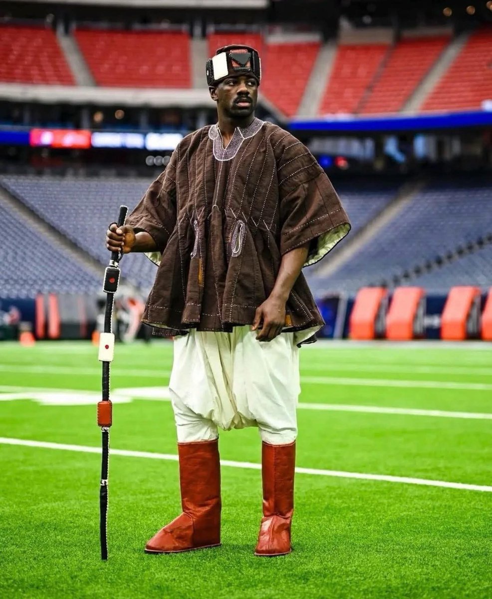 A Ghanaian-American Jeremiah Owusu-Koramoah, a National Football League player for the Cleveland Browns, wearing arriving at a game in Ghana’s fugu.