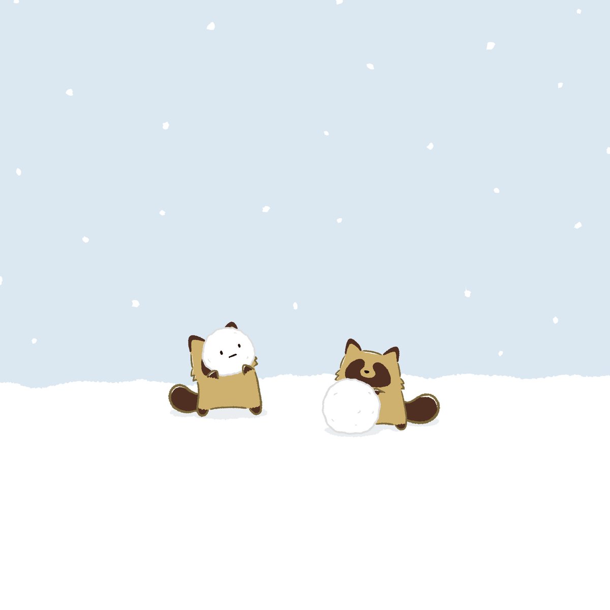 雪だるまをつくるタヌキ