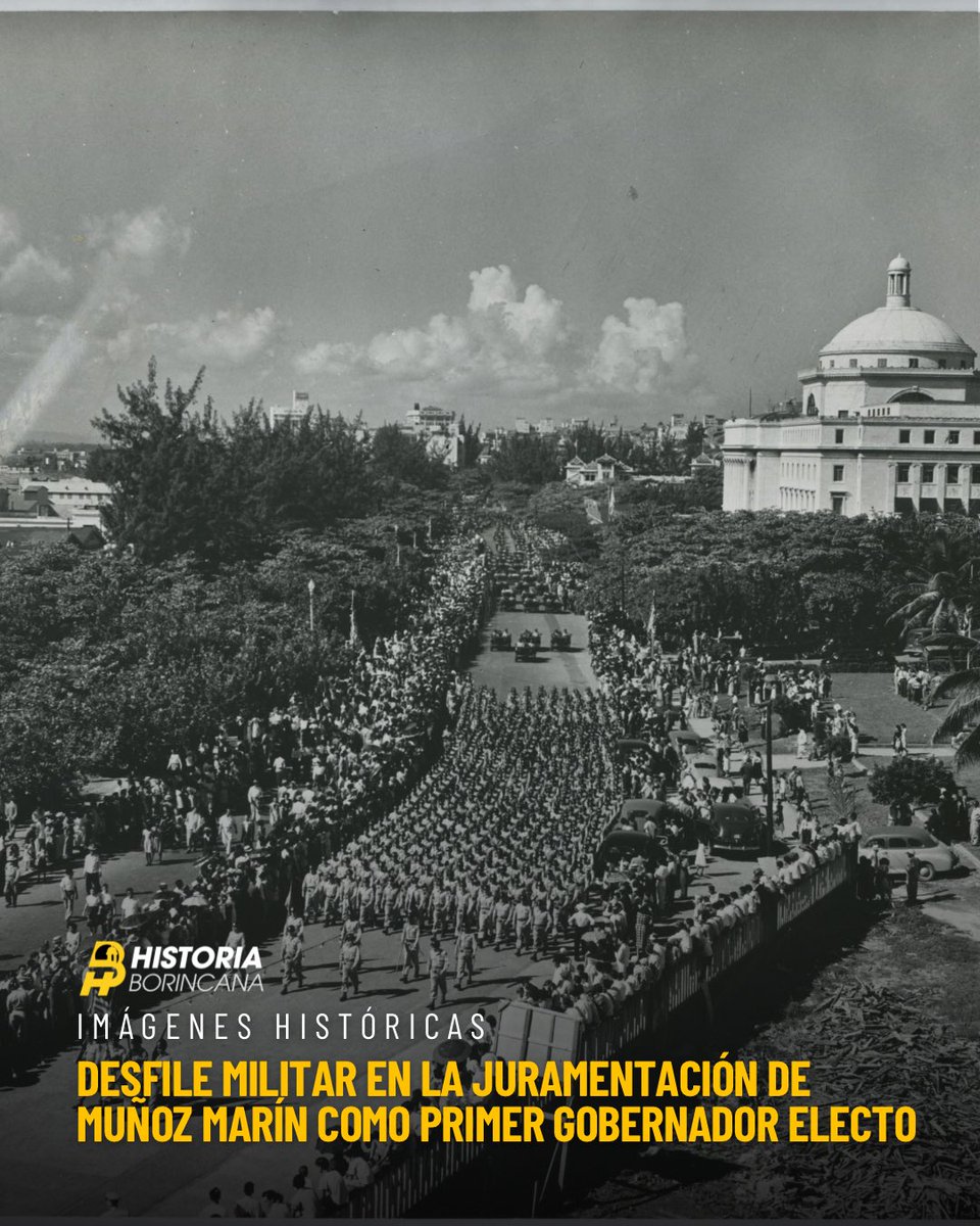 El 2 de enero de 1949 por primera vez Puerto Rico juramentaba a un gobernador electo por el pueblo, Luis Muñoz Marín.  

La imagen captura ese día desde una perspectiva privilegiada, mientras un desfile de fuerzas armadas avanza en formación por la avenida y miles de personas se