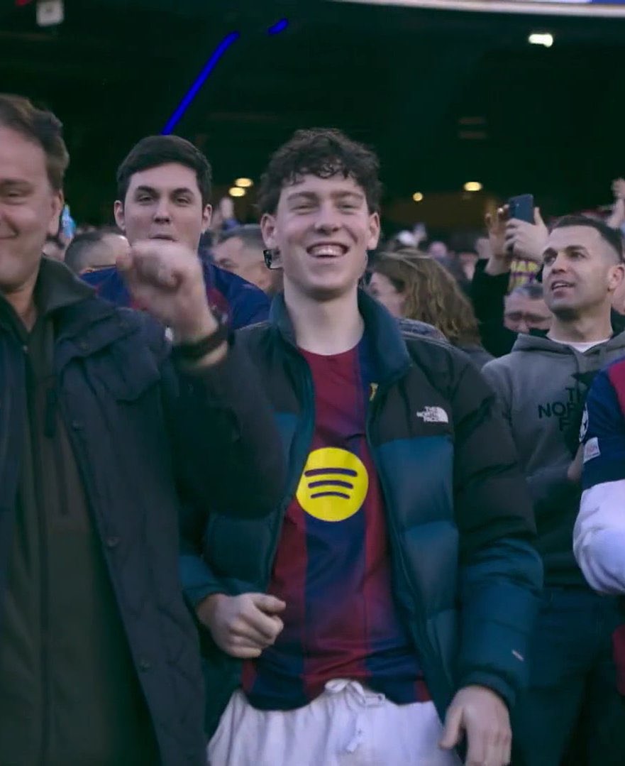 Bastoni in the stands supporting Barcelona