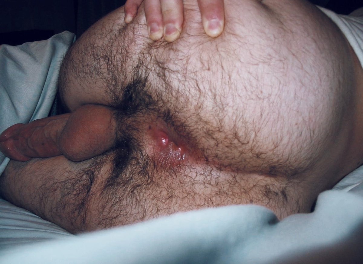 Cheeks apart, hairy hole out