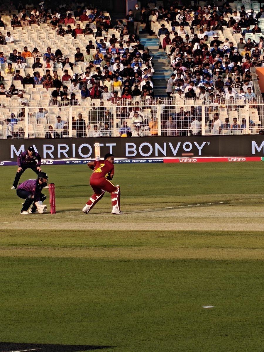 titask9's tweet photo. Decent cricket at the Eden Gardens, Kolkata today with @windiescricket pulling it off against a spirited @CricketScotland team, in the #T20WorldCup !

All- power- Hetmyer with the bat, couple of blinders as outfield catches from both teams, with Shimron starring again....... https://t.co/olL2ETu4sv