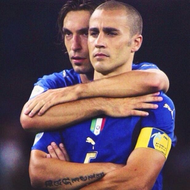 Footballtweet's tweet photo. 🗣️🇮🇹 Andrea Pirlo on the iconic photo of him alongside Fabio Cannavaro at the 2006 World Cup final in Berlin, reflecting on what that moment truly meant:

"In that moment, while we were facing a penalty in the final shootout of 2006, I remembered all the penalty shootouts we had lost in the past few years. I was terrified and couldn't find anyone to talk to, so I hugged Cannavaro and said, 'Fabio, I'm scared.' 

He didn't respond. We kept watching the penalties, and I said again, 'Fabio, I'm scared.' Still, no response. 

Just as I was about to say it a third time, he interrupted me and said, 'Shut up, Andrea! I'm about to lift the World Cup in a few minutes.'"