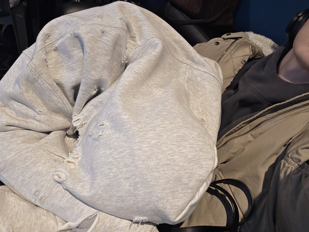 pageofsoobim's tweet photo. The pile of of clothes on my lap is kang Taehyun, does he think my legs are his pillow or something? (Good thing he is cute, so I am allowing it. 🤷‍♂️) https://t.co/cxjUDxdar2