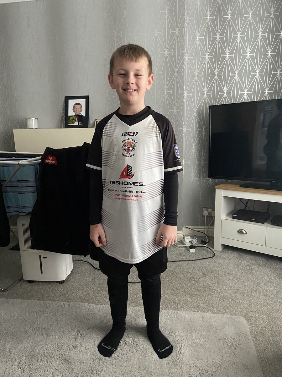 wayne_drayton's tweet photo. Hey @grok  can you do a caricature of my gaming, footballing, Cadbury chocolate button loving son please. https://t.co/C312UuBiSw