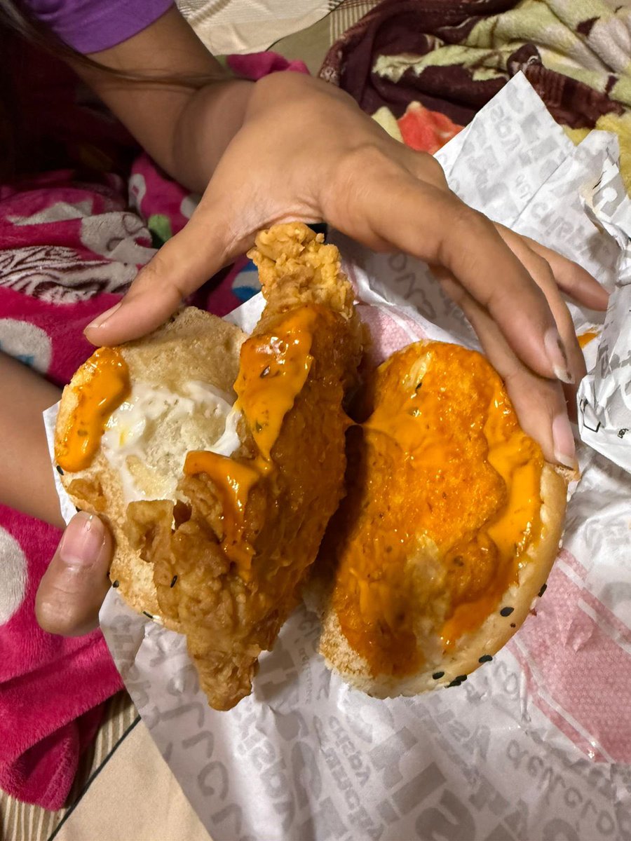 sumeetys's tweet photo. I frequently order @KFC_India @kfc but disappointed with current order from @zomato 
My zinger burgers were with no lettuce, no onions, and no cheese. The bun seemed very unusual and not KFC used buns. Please look into this as they had fooled us @zomatocare https://t.co/l0dhvj0art