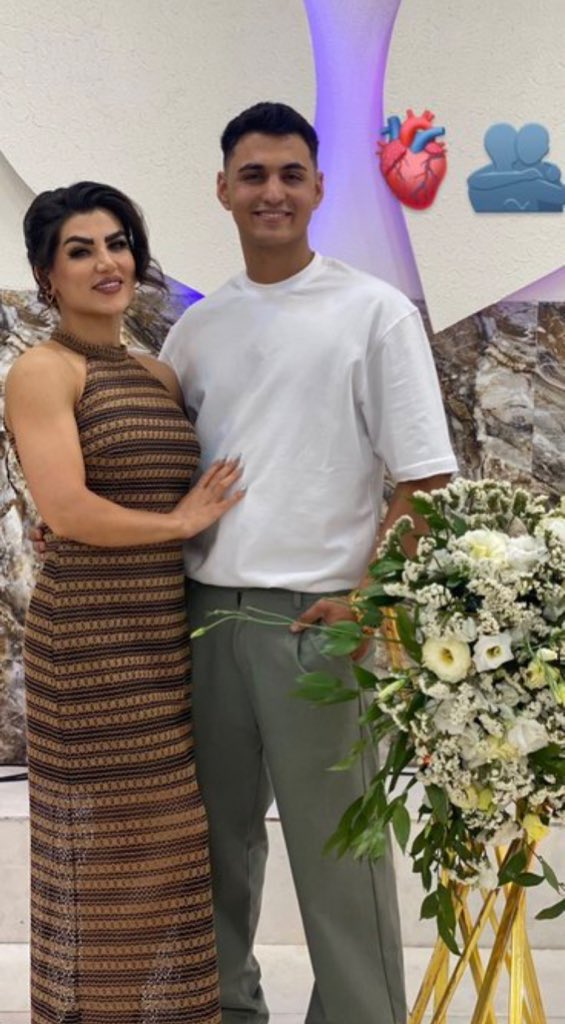 Panizachi's tweet image. This is a mother smelling her son’s clothes after he was killed by the Islamic Republic on the orders of Ali Khamenei. The only negotiation should be about overthrowing the IR and changing Iran’s regime.
be human.
#IranMassacre #محمدرضا_قربانی 
این مادری است که لباس‌های پسرش را