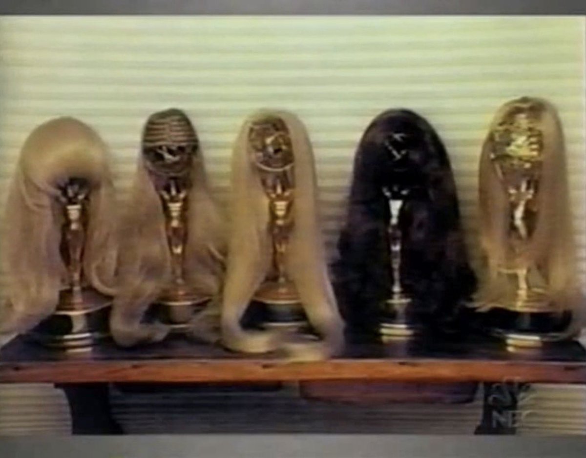 Photo Peter Falk took of his five Columbo Emmy’s after he saw that his wife was using them as wig stands