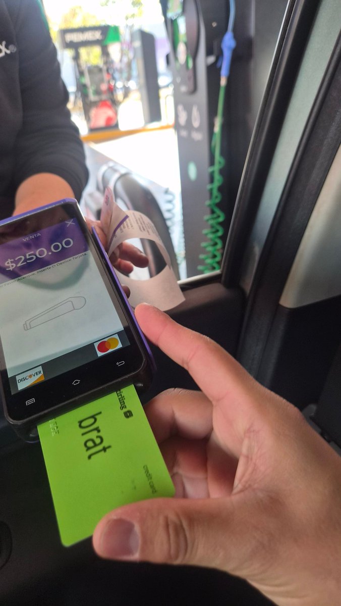 Me acting normal ❌️

The real me trying to pay with my official brat credit card from the moment (2026) at te gas station ✅️