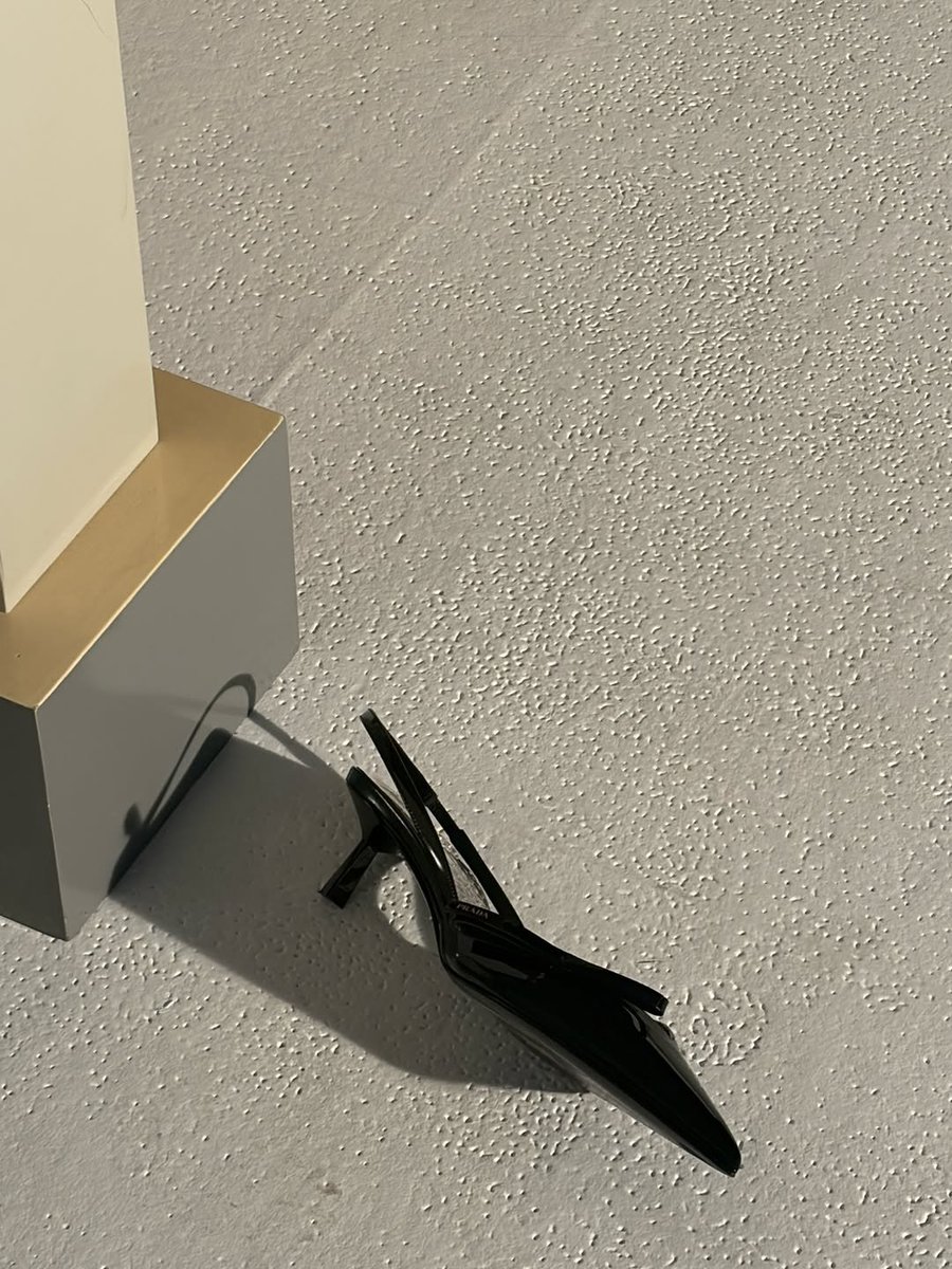 A calm gaze, restrained poses, and minimalist styling create a cool yet refined atmosphere, like capturing a fragment of a fashion editorial story.