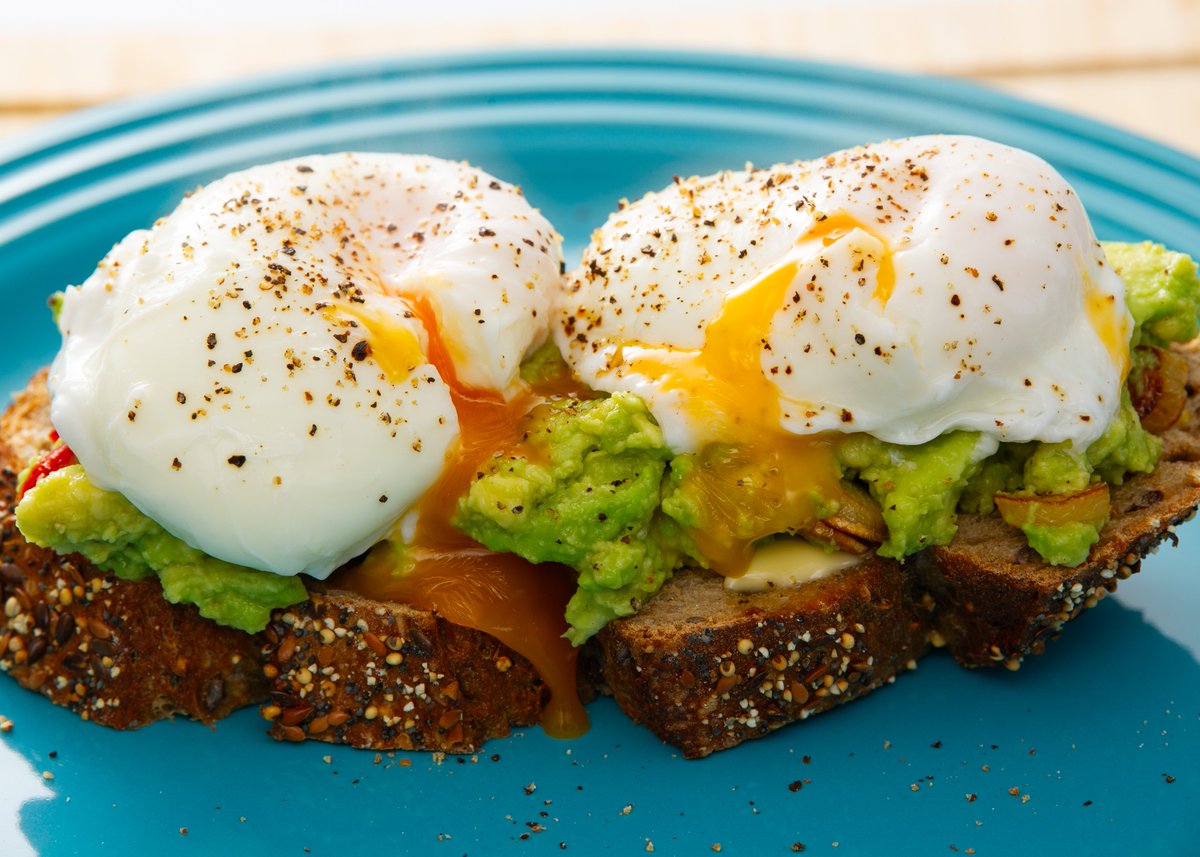 Intended rustling-up a Full English Breakfast this morning, but then decided I wanted something lighter. So ... Poached Eggs and Smashed Avocado (Avocado, Fried Garlic, Fried Chillis, Salt, Pepper, Lime Juice, Olive Oil) on Buttered, Lightly-toasted Seeded Sourdough Bread.