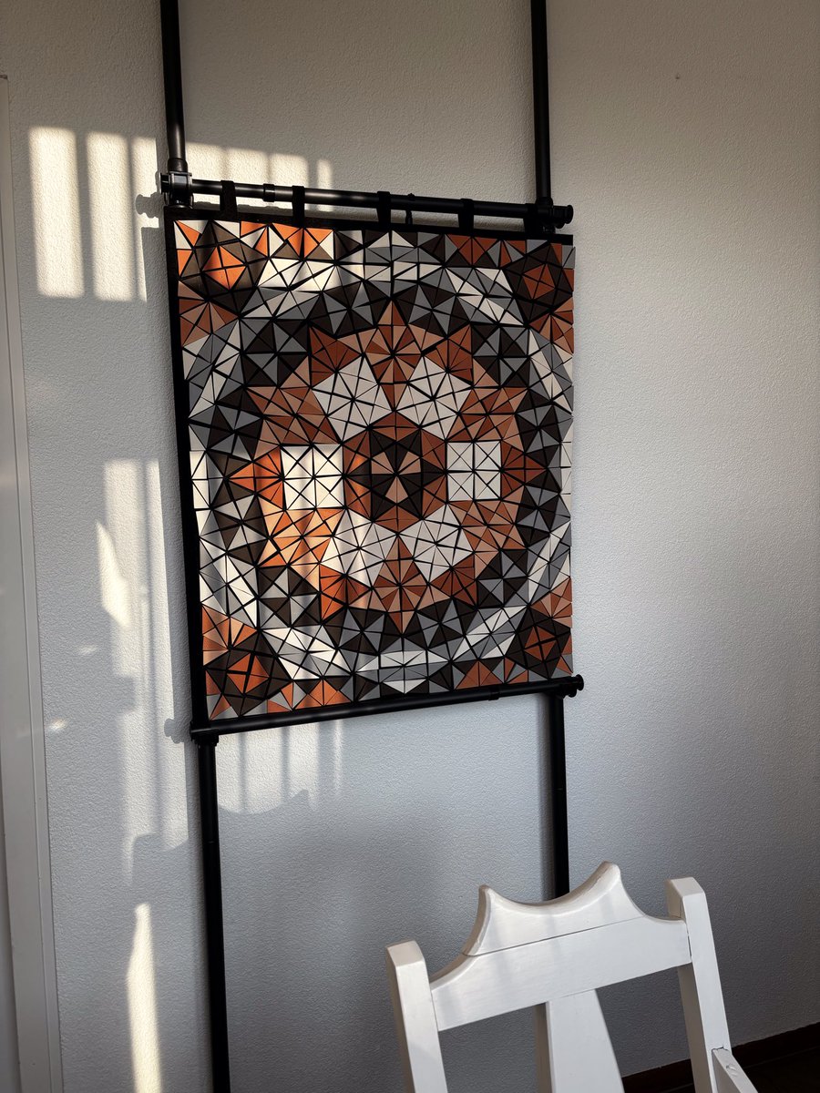 Joha99es's tweet photo. @Marcusdusautoy Symmetry. I have been making mosaics for years. These are made of 2 shapes. Namely the half equilateral triangle and the isosceles triangle, the long sides of both are equal. Right now I'm making them ceramic. Because I provide them with Velcro, they can be reused https://t.co/rXsrNLjvhr