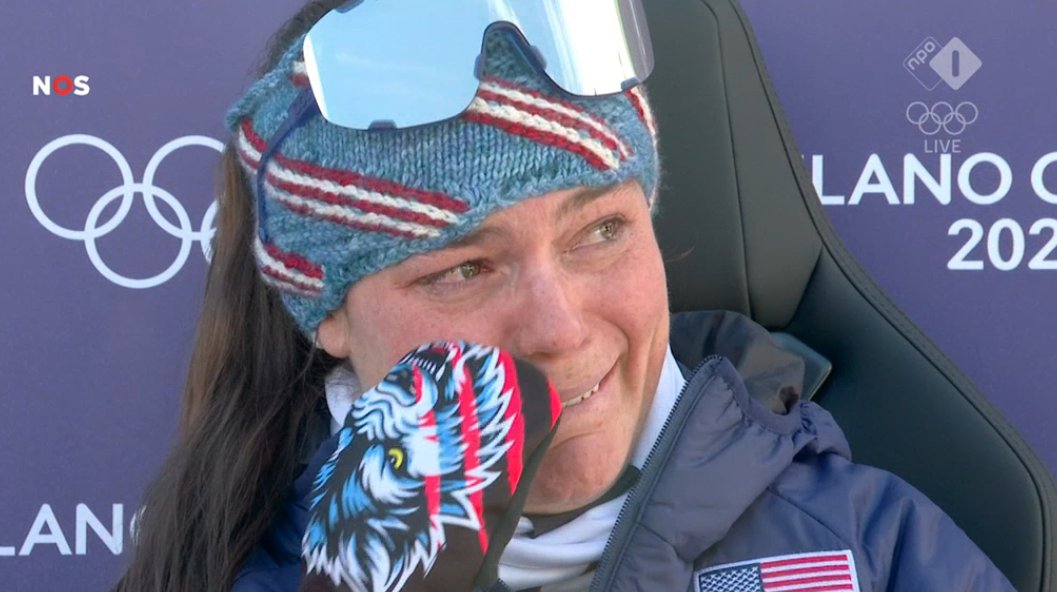FootballAndAll's tweet photo. Breezy Johnson is incredibly emotional sitting in the gold-medal chair after watching her friend and team-mate Lindsey Vonn suffer a serious crash. #Olympics2026 #Olympics #MilanoCortina2026 https://t.co/AaEm2mCxDp
