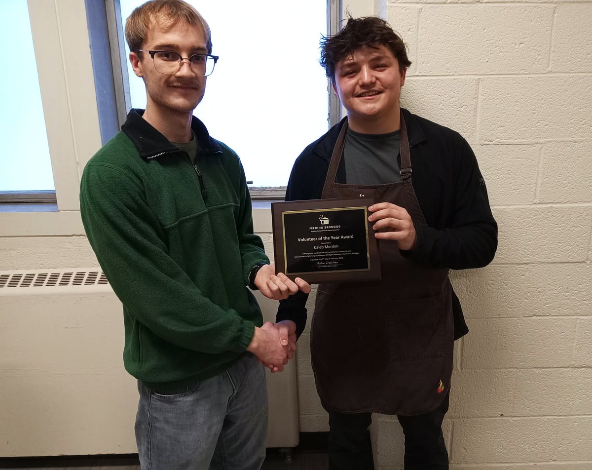 <a href="/FeedingBroncos/">FeedingBroncos</a> President, Aden DeWees, right, presents the Feeding Broncos 2025 Volunteer of the Year Award to <a href="/WesternMichU/">Western Michigan University</a> student Caleb Morden. Congratulations.