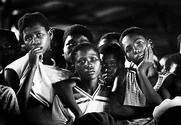 HistorySAZAR's tweet photo. Youth in the northern Transvaal township of Leandra mourned the death of their leader, Chief Ampie Mayisa, during his funeral. Chief Mayisa was beaten to death and his body and his house were burnt by vigilantes in Lebohang, Leandra, Transvaal, on 11 January 1986. Chief Mayisa supported a group of young `comrades` who sought refuge in his house on the day of his murder. Photo by Joanne Rathe