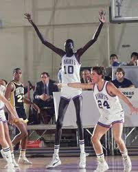 JohnnyKoho's tweet photo. @festive2018 @DRGuruleWyo Long arms are a definite advantage in curling. Manute Bol would gaurantee Sudan a gold medal. https://t.co/Aq8Zwtzutj