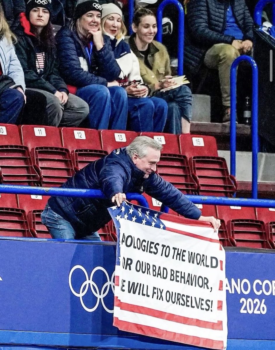 Get on with it guys, the world is losing patience….

A spectator at a figure skating event in Milan on Saturday held a banner of the United States flag with a message of apology.
