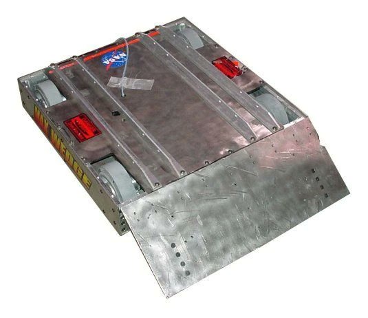 they should've fitted the doggie wheelchair with a battlebots wedge so she could put up some crazy numbers