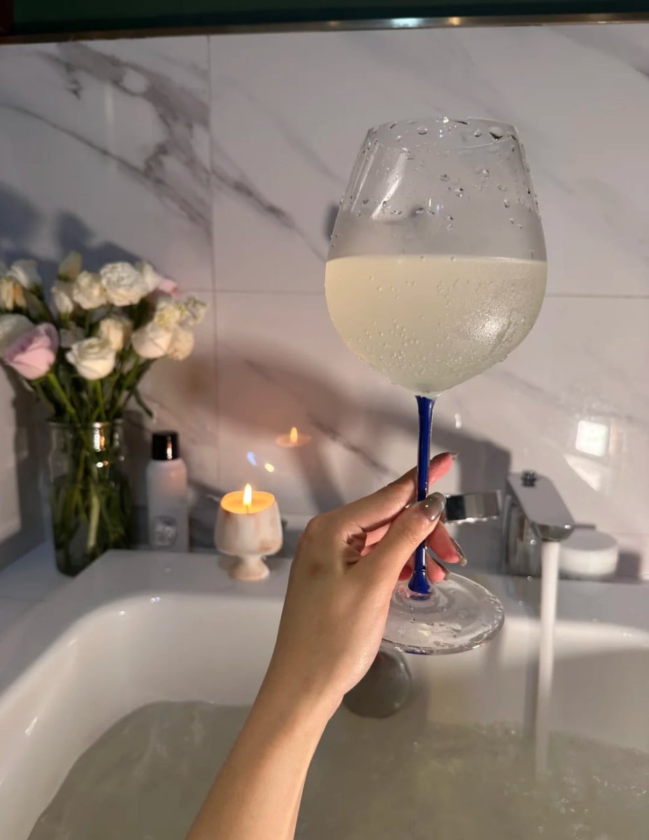 💕 Indulging in a moment of pure bliss. 🛁🍷 Tonight's agenda. self-care, a cozy bath, and a refreshing drink. 🌿🕯 Here's to unwinding and celebrating the little things in life. Cheers to relaxation.