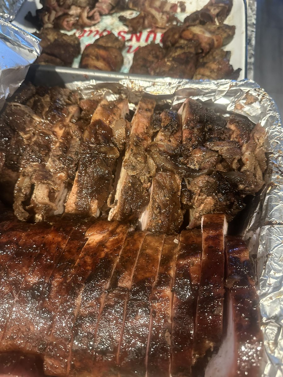 KellBell0430's tweet photo. #SuperBowlLX READY! And got our custom made shirts, complete with our @TPUSA  @KidRock #halftime #AmericanBadass backs!  #smokedporkloin #boudinjalapenopoppers #baconwrappedvenison #texasbbq  #Merica @MichaelBerrySho @RamonRoblesJr https://t.co/qPqhGck9YJ