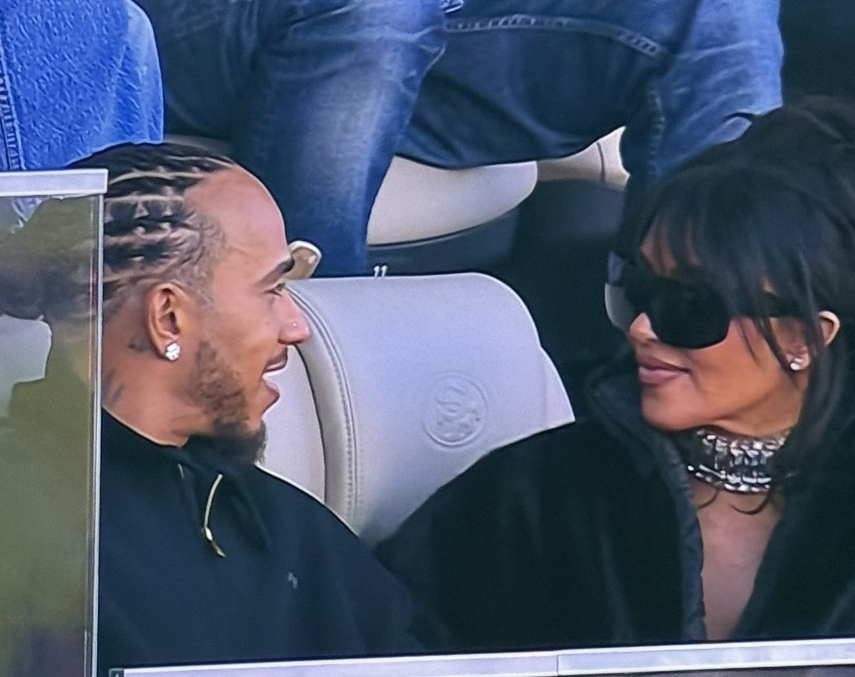 PopBase's tweet image. Kim Kardashian and Lewis Hamilton at the #SuperBowl.