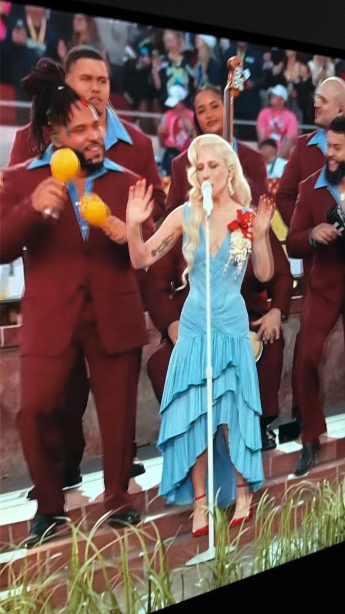 PopCrave's tweet image. Lady Gaga makes surprise appearance during Bad Bunny's #SuperBowl Halftime Performance doing a Latin rendition of “Die With A Smile.”