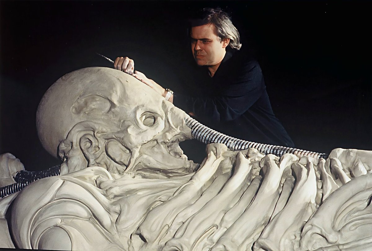RJCrowtherJr's tweet image. H.R. Giger's original concept art for the Space Jockey in Alien and photos of him sculpting and painting the magnificent prop. #HRGiger
