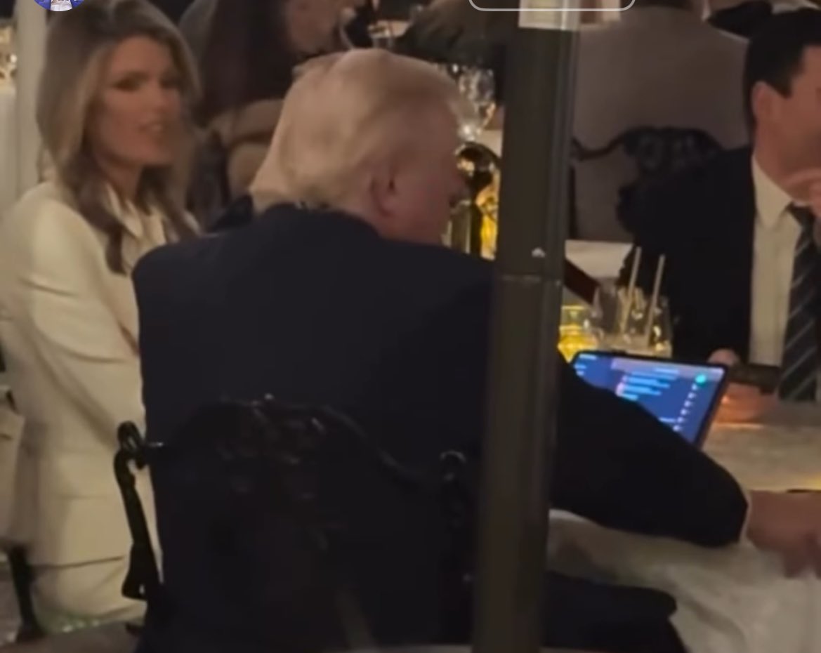 Trump Ipad What was Trump looking at on his IPad during dinner?
