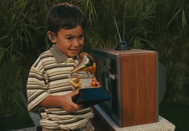 Little Boy holds a GRAMMY award during the #SuperBowl halftime show before Nicki Minaj who is very large and bitter.